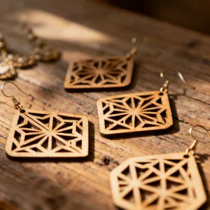 Laser cut wooden jewelry and earrings made with Glowforge Aura